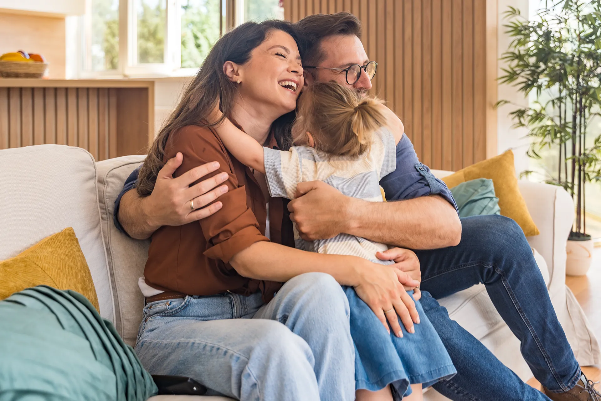 young happy family hugging